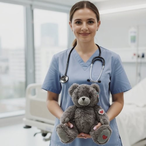 healthcare professional holding a heartbeat bear